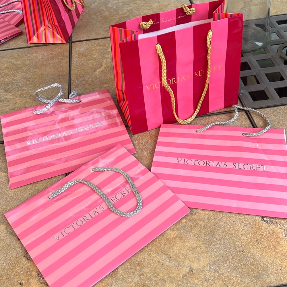 Set of 4 Victoria’s Secret shopping bags.